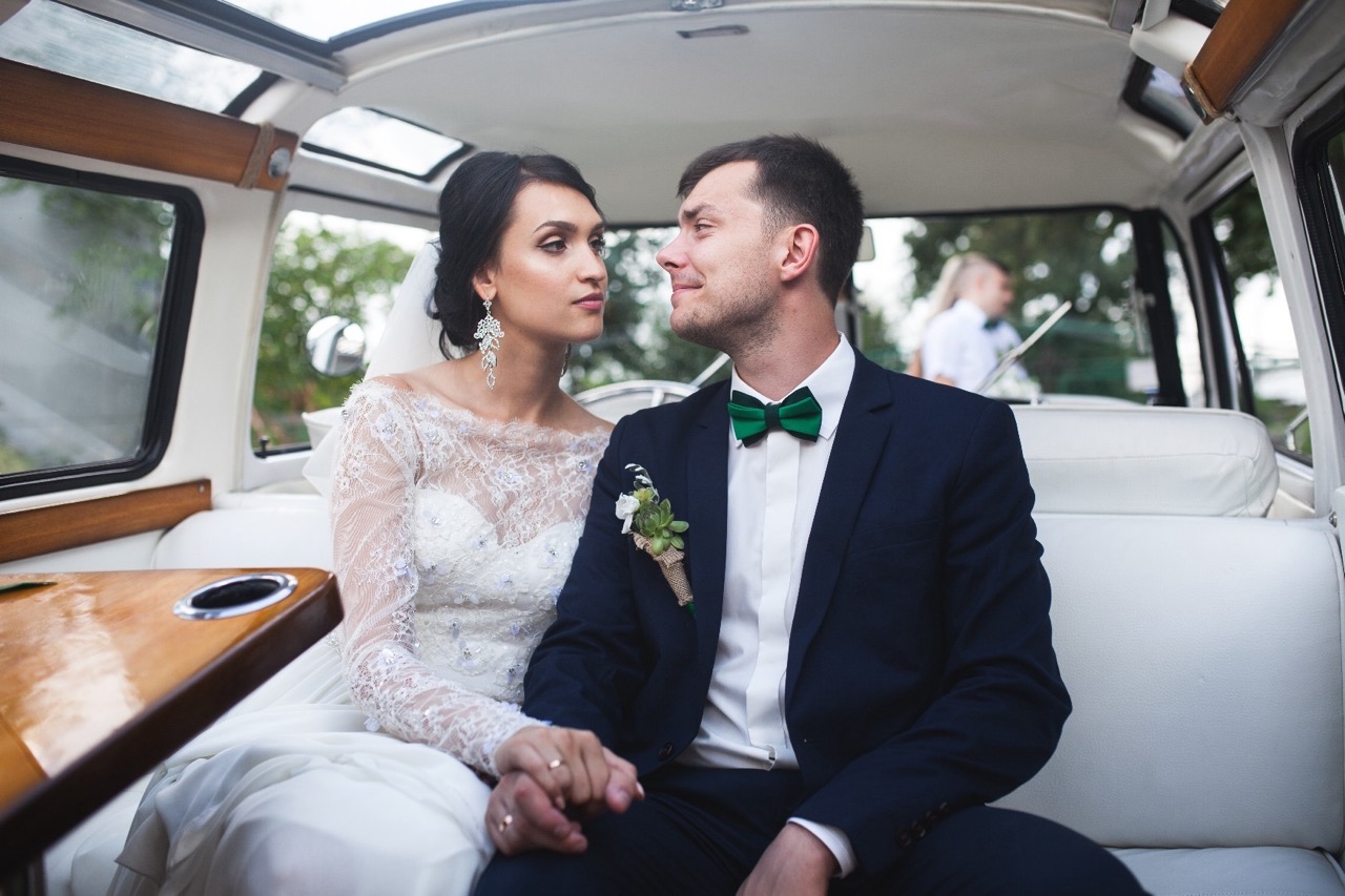 Wedding Couple in Limousine Interior